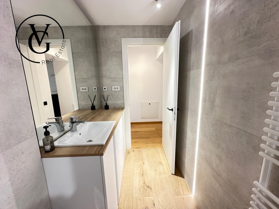 Duplex modern cu terasă, grădină și sistem smart home complet