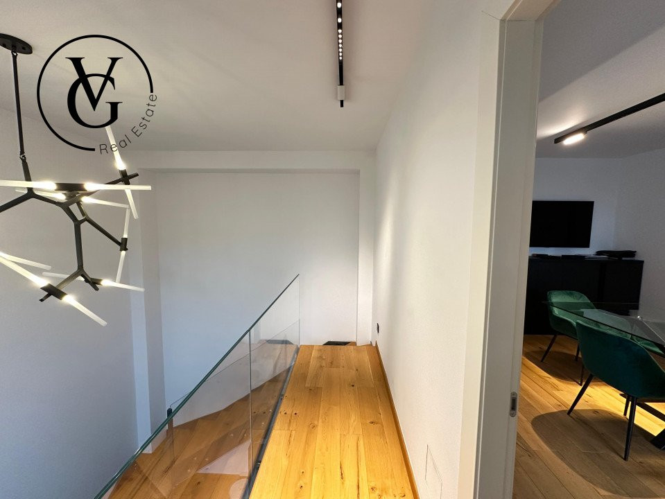 Duplex modern cu terasă, grădină și sistem smart home complet