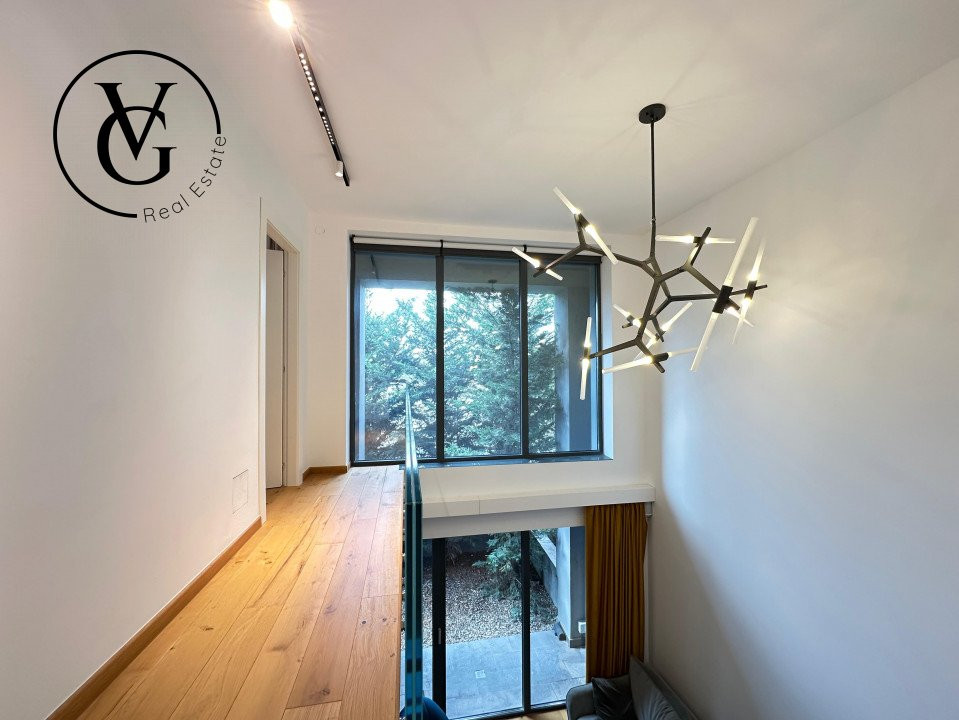Duplex modern cu terasă, grădină și sistem smart home complet