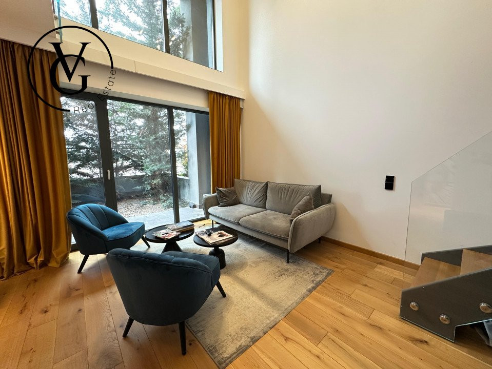 Duplex modern cu terasă, grădină și sistem smart home complet