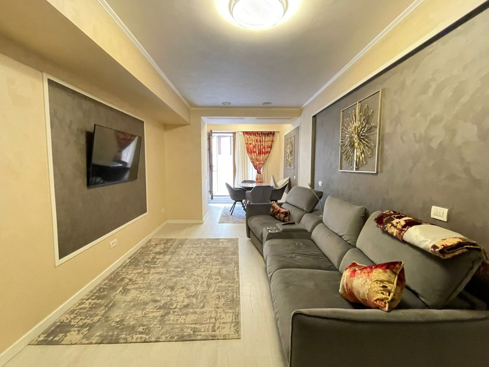 Apartament de 3 camere și curte privată - Parcare subterana
