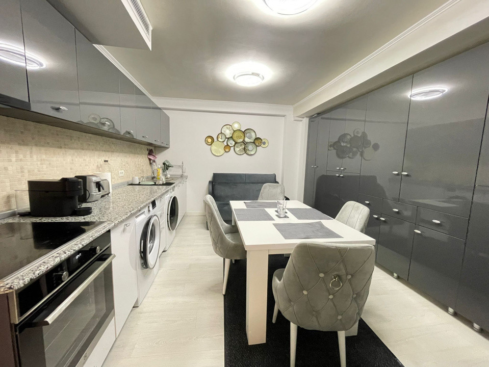 Apartament de 3 camere și curte privată - Parcare subterana