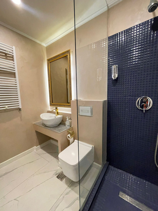 Apartament de 3 camere și curte privată - Parcare subterana